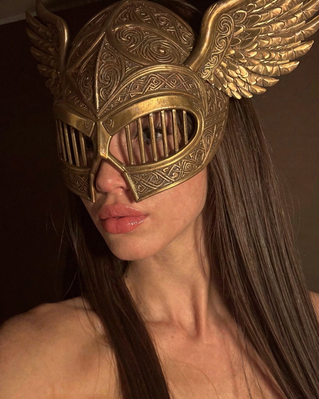 Close AI portrait of a woman wearing an ornate bronze fantasy helmet in warm light